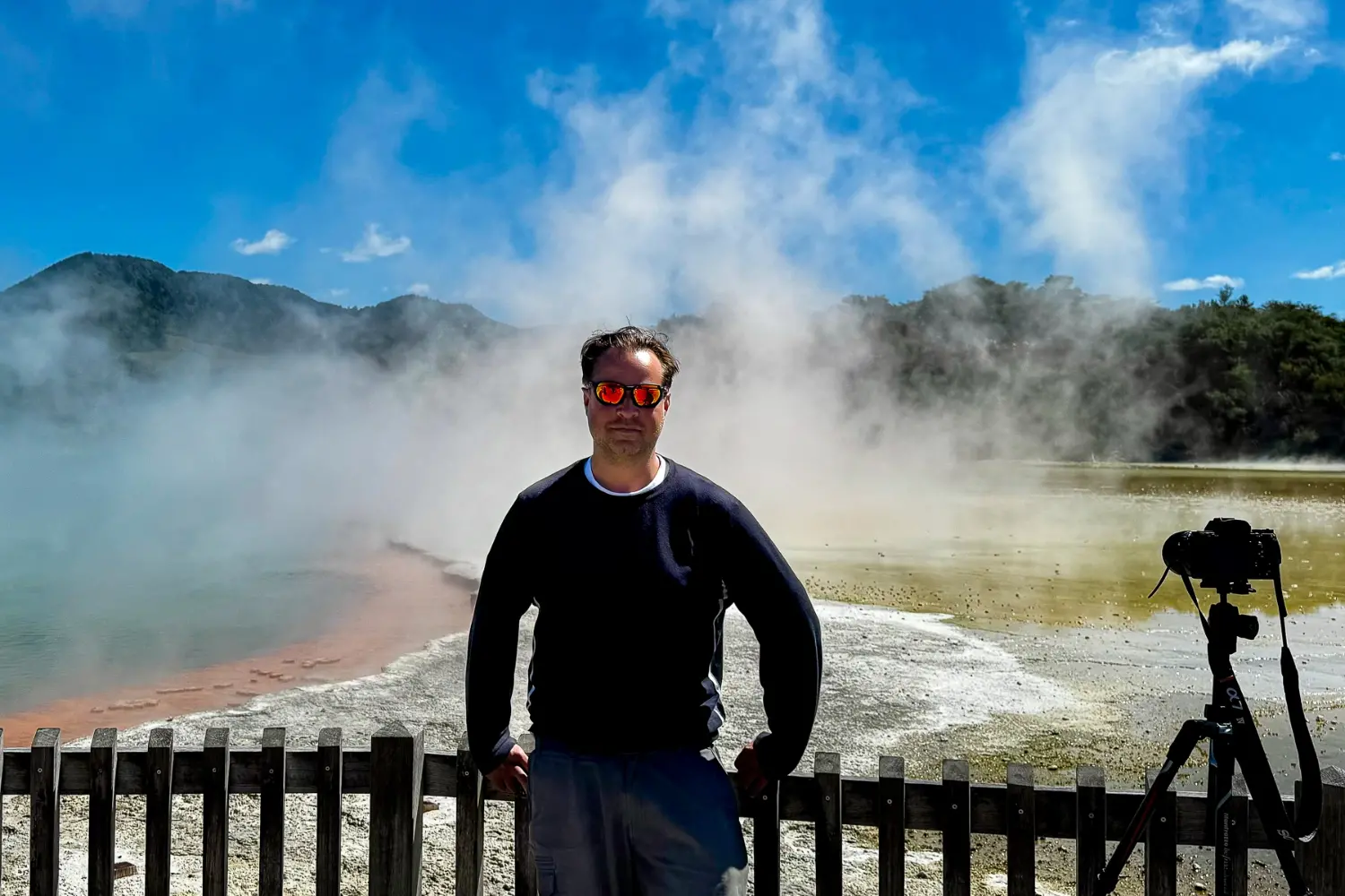 Duncan Richards taking photographs at Wai-o-tapu, New Zealand